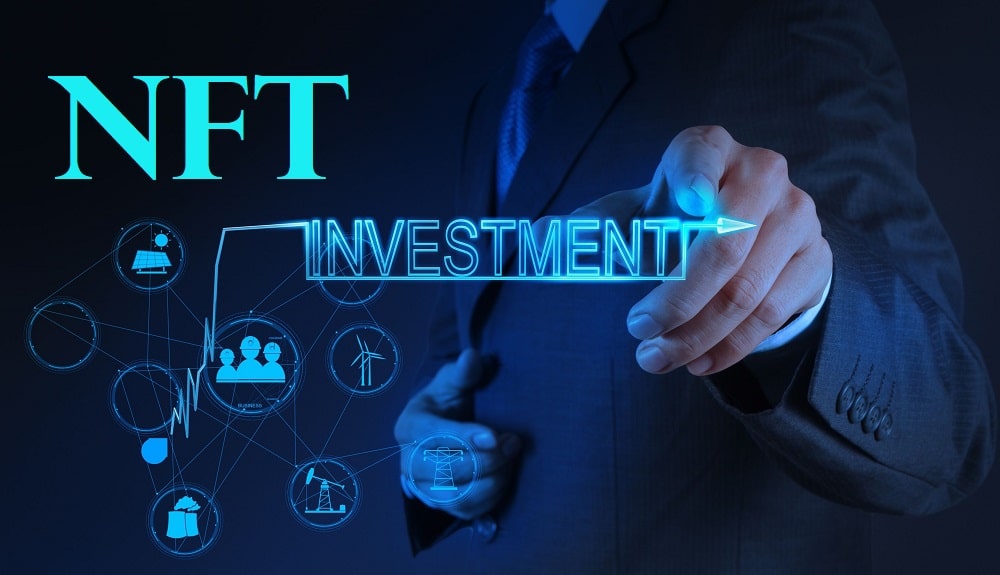 businessman hand pointing to investment as concept
